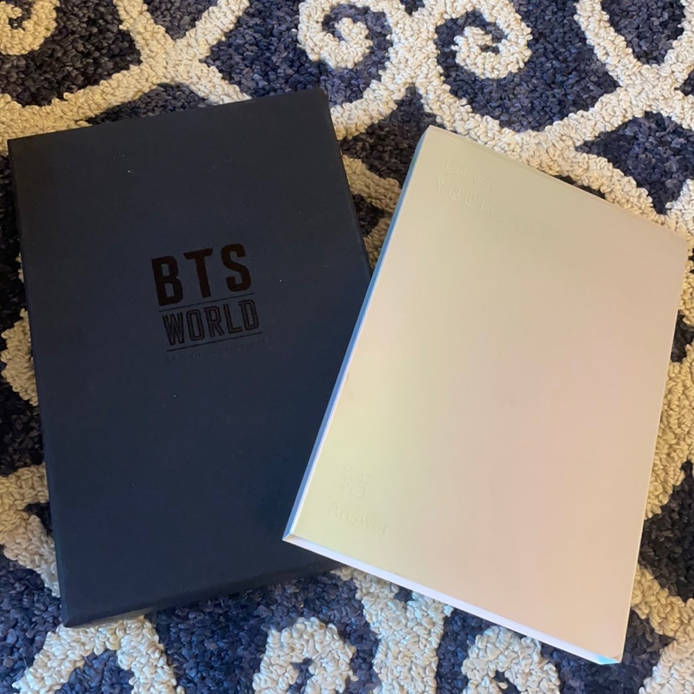 BTS albums including a photocard of Jin!